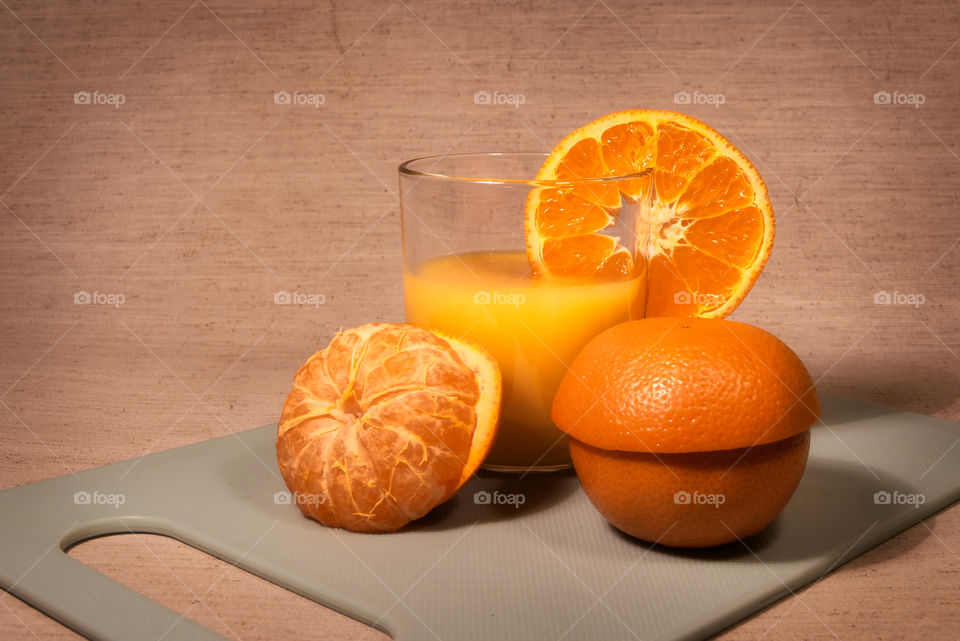 Healthy fresh orange juice with orange slices