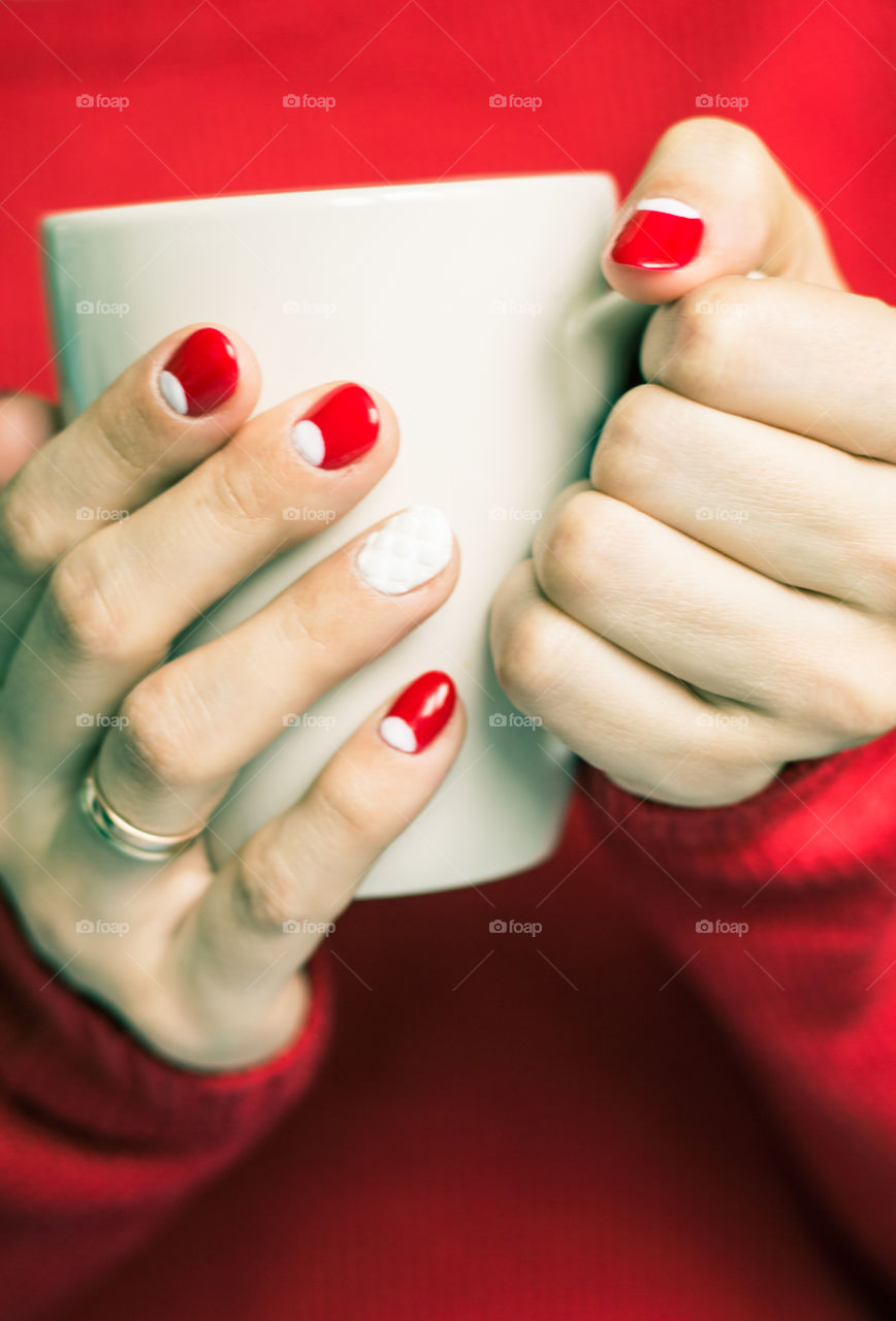 woman hand with cup of tea