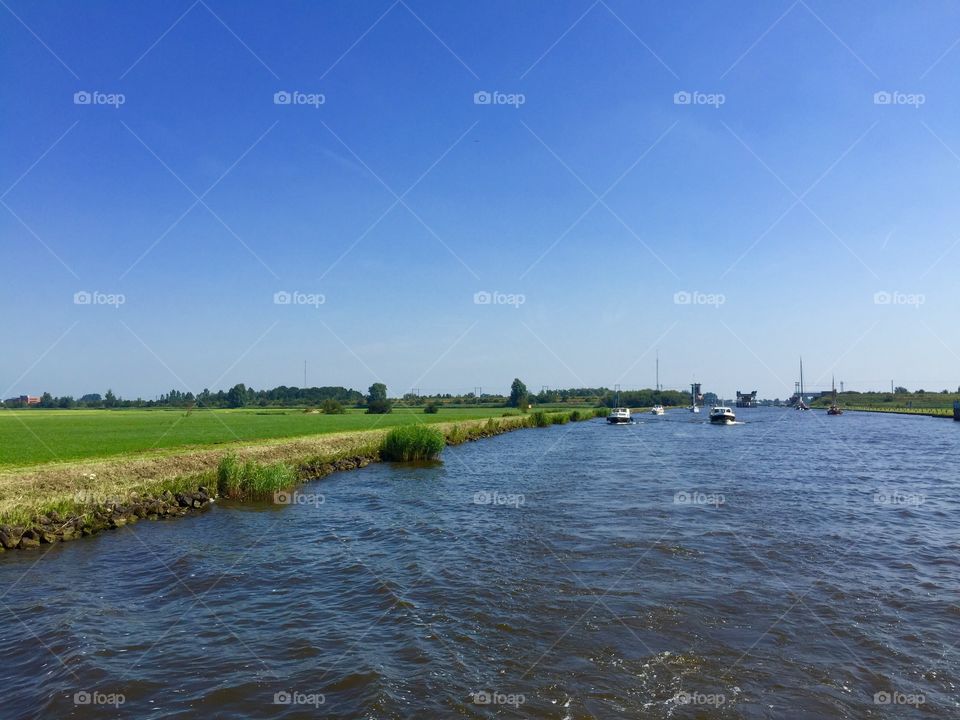 Dutch river in summer. River in a small village in the netherlands in summer