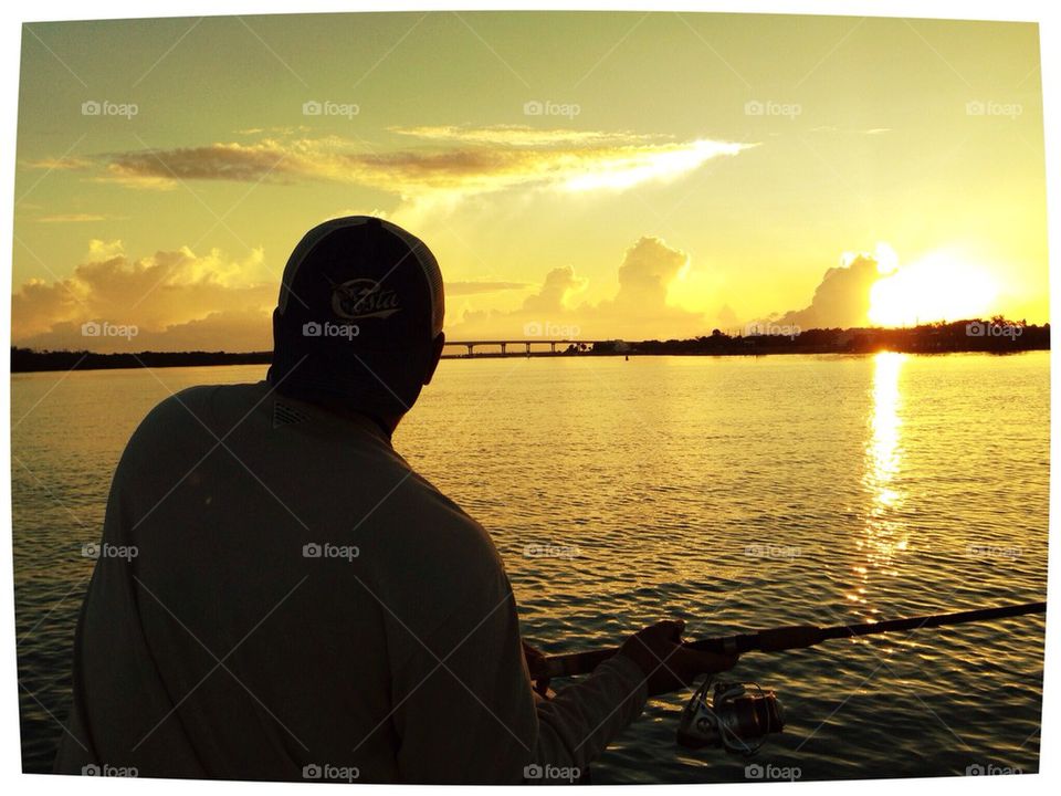 Fishing at sunrise