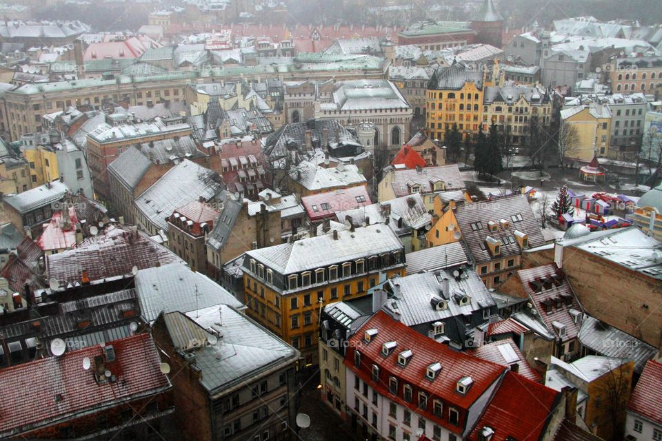 snow-covered roofs of houses from a bird's eye view