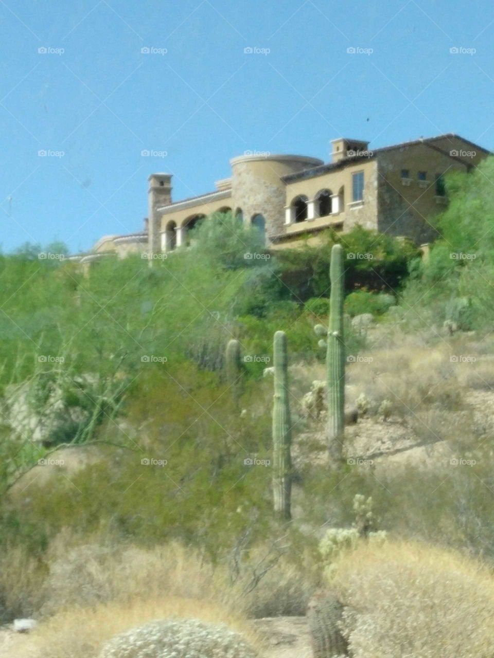 house on a desert hill