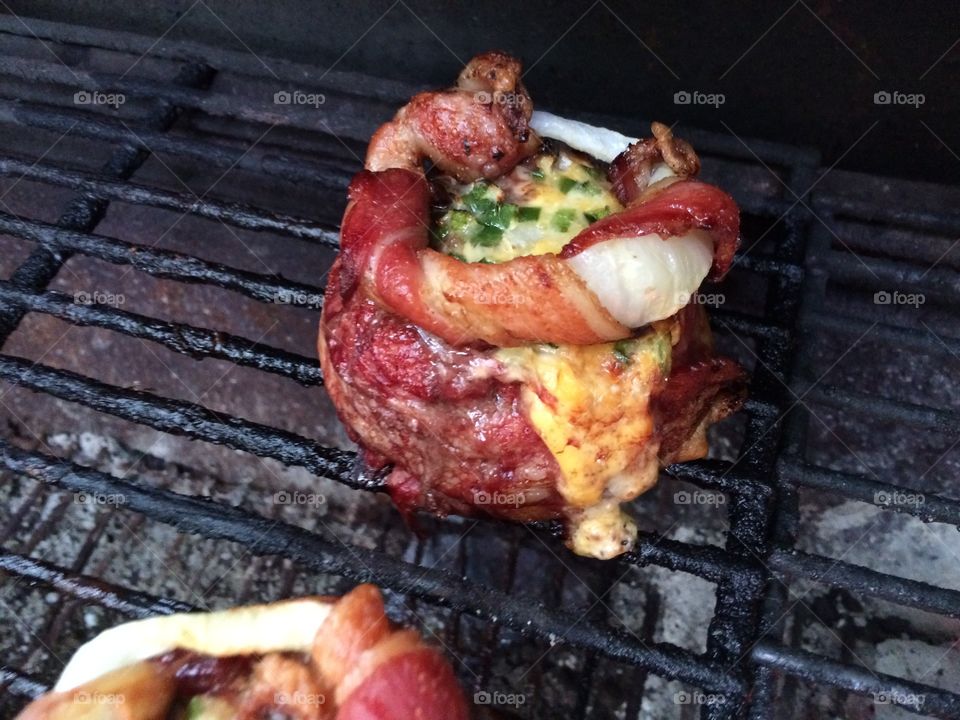 Grilling a cheese & bacon lava burger
