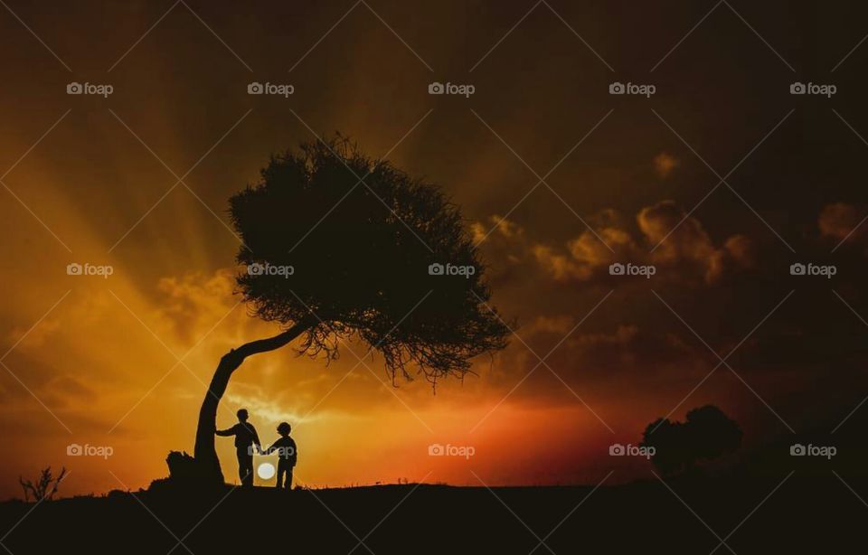 holding hand at the sunset gream momment lass for ever