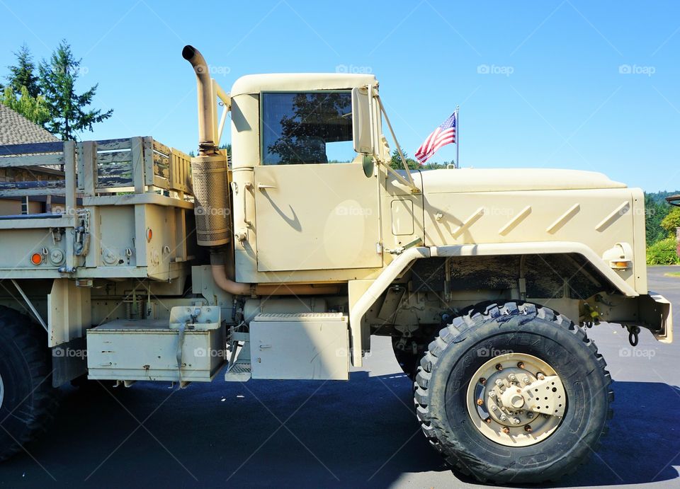 Front Yard Tank. I don't know why, but friends of mine have this full on military vehicle in their front yard drive. It's rad.