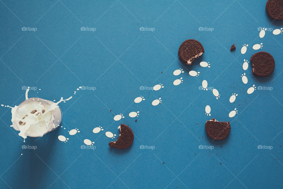 Oreo cookies and milk. Food art.