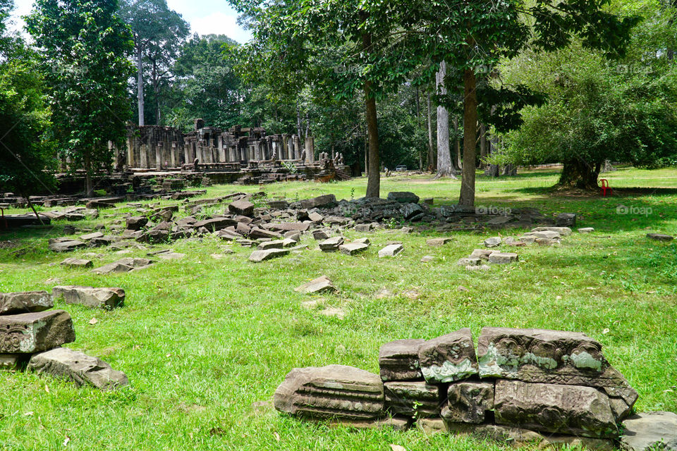 ruins of bayon temple at angkor archaelogical site