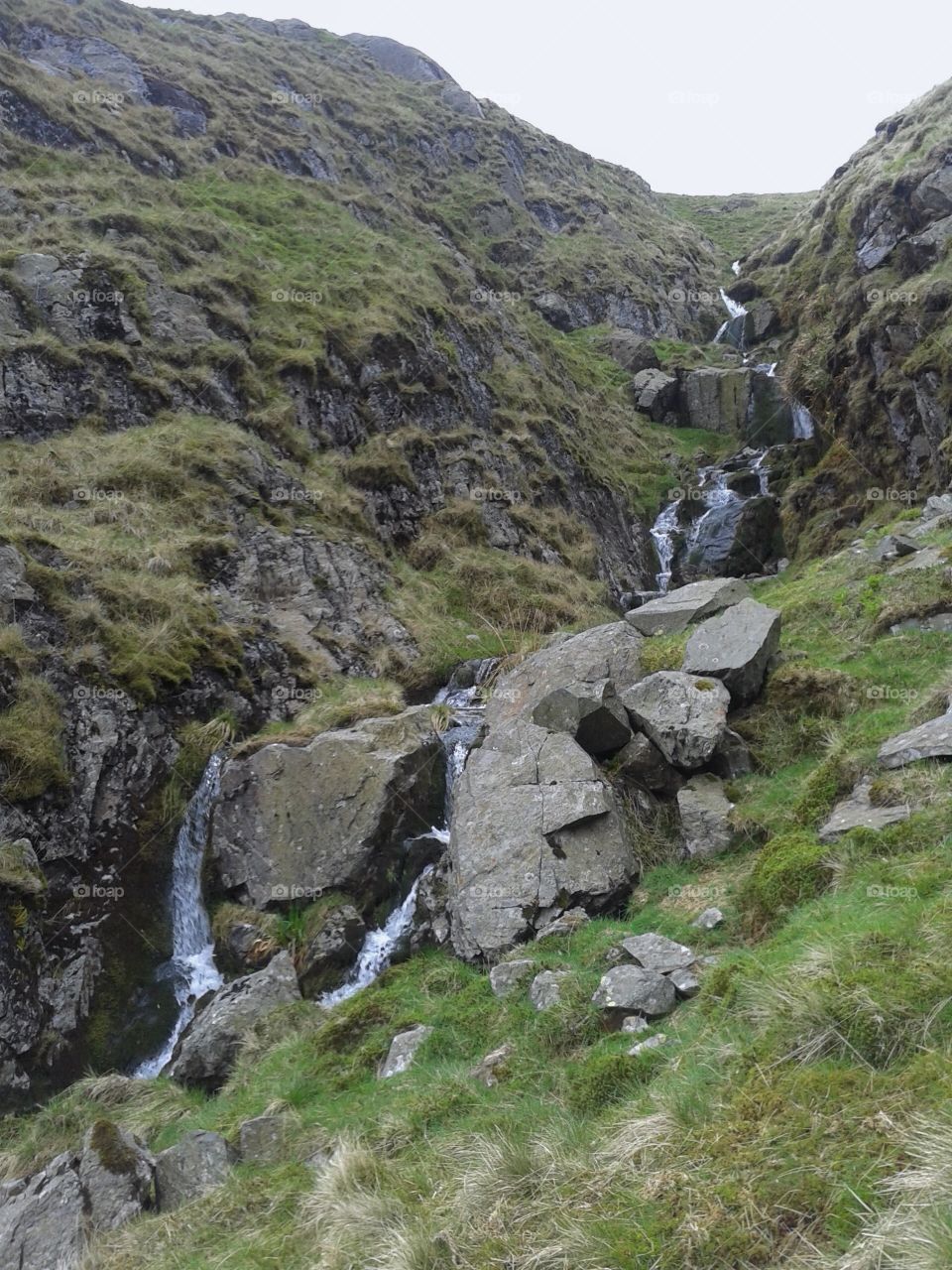 Another stream in the Furness Fells of Cumbria, slowly eroding the sturdy rock beneath it, carving its way through the mountain.