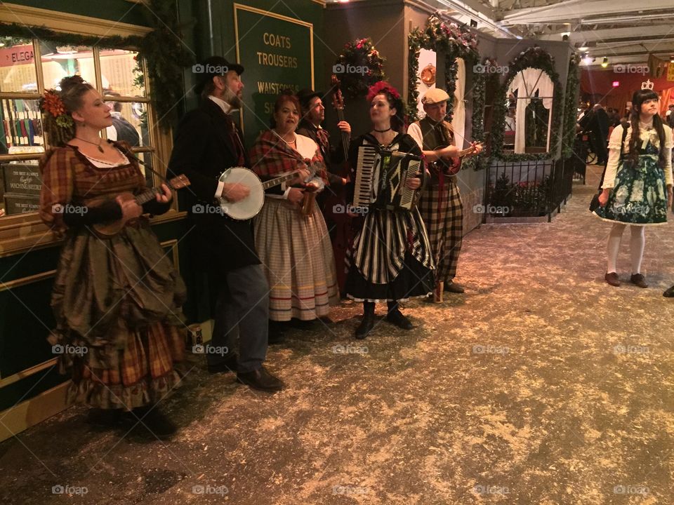 A band plays during a Dickens Fair in Daly City. 