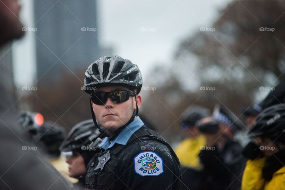Chicago Police department watching protesters.