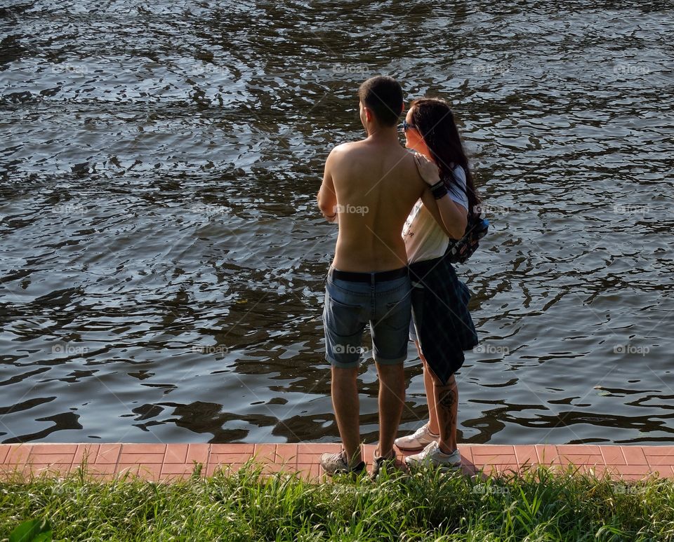 Couple by the water. 