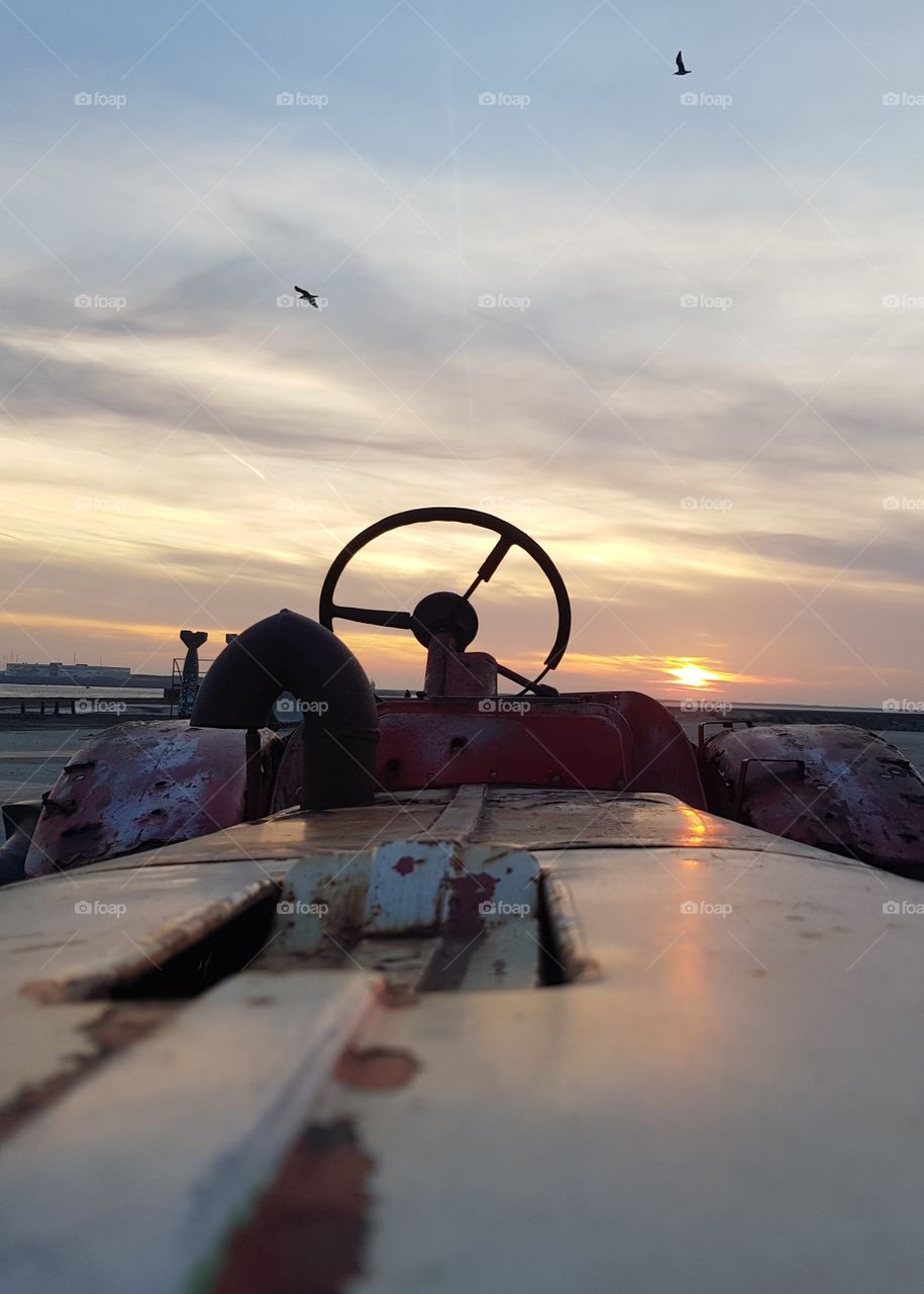 Tractor top view sunset