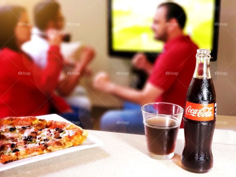 Enjoying the game with Coca Cola!
