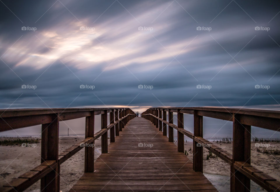 Cloudy sunset with a dock