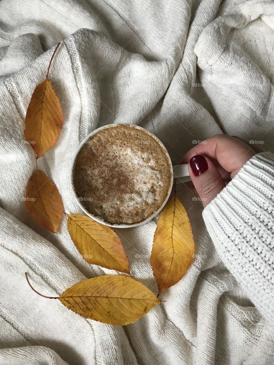 When fall is here, you gotta get yourself a hot drink and a cozy sweater.