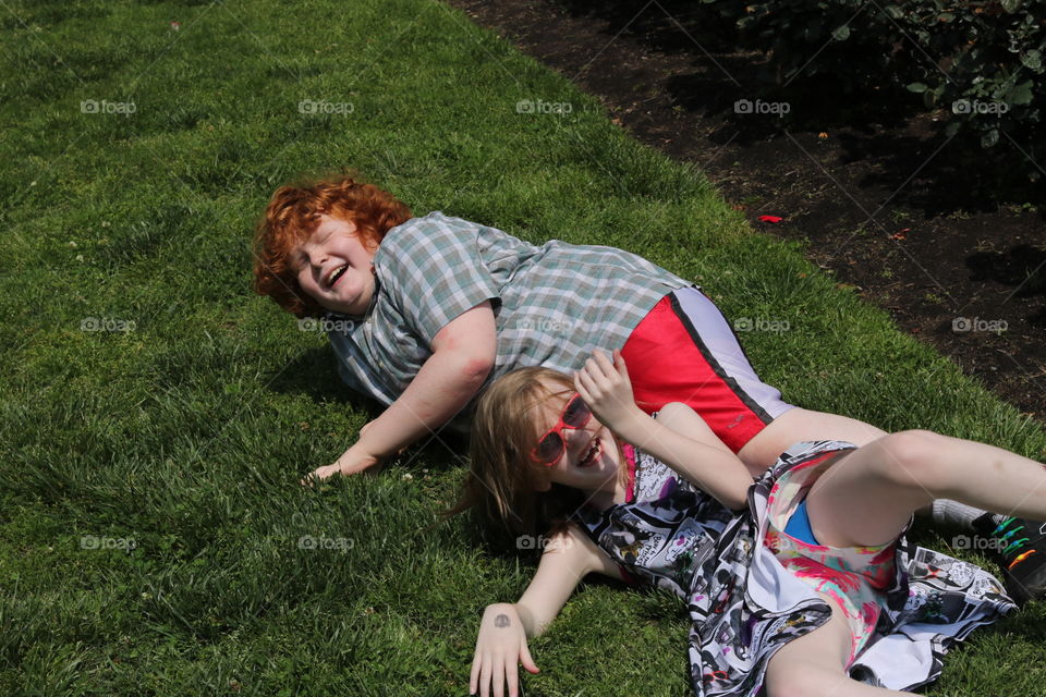 Kids falling down and laughing