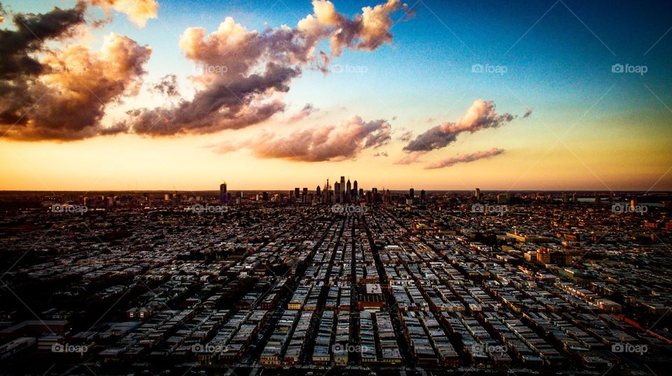 Drone shot of Philly skyline during sunset