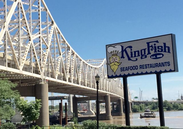 Sign by bridge