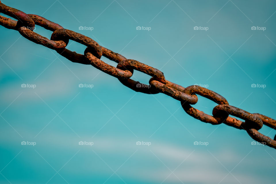 Rusty iron clings to the background of the sky.