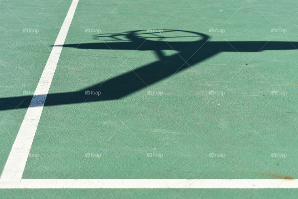 Green cement basketball court abstract design