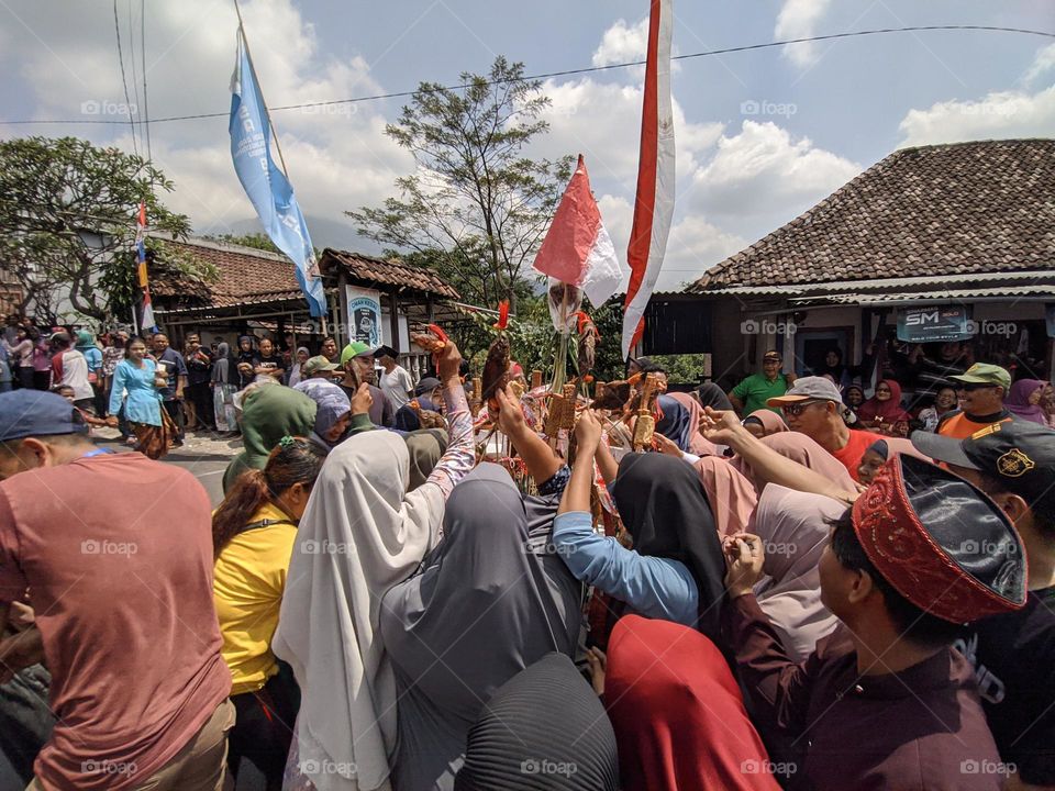 carnival and alms earth events in rural Indonesia