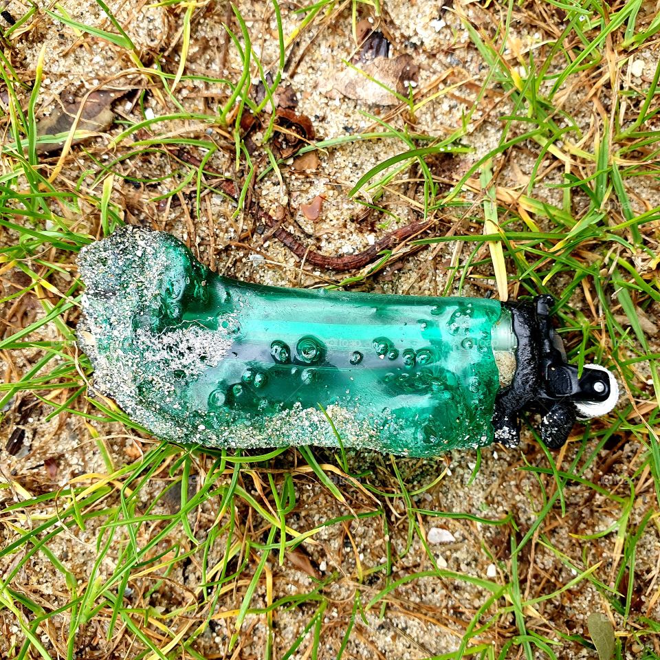 Green non-working lighter.