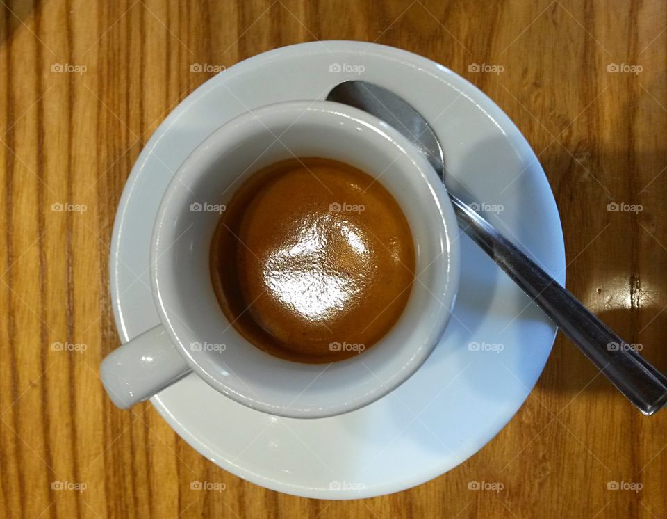 cup of italian espresso coffee view from above