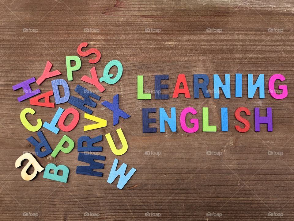 Learning english language, colorful wooden text 