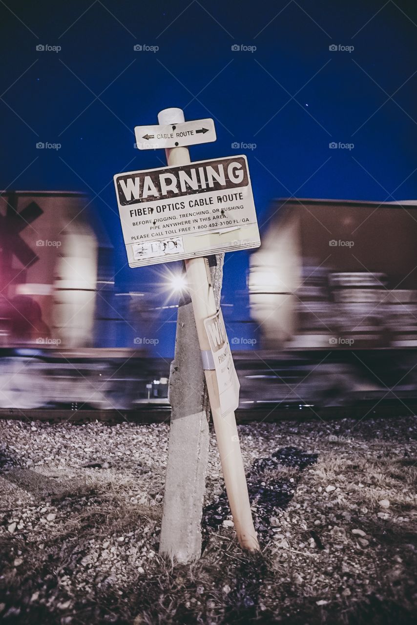 Random Warning sign by train track 