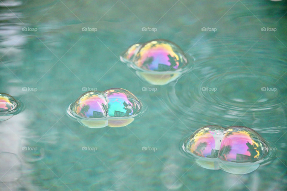 Close-up of bubbles on rippled water