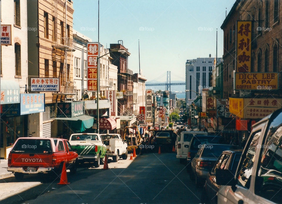 Street in China Town with a view of Oakland Bridge (San Fran.)