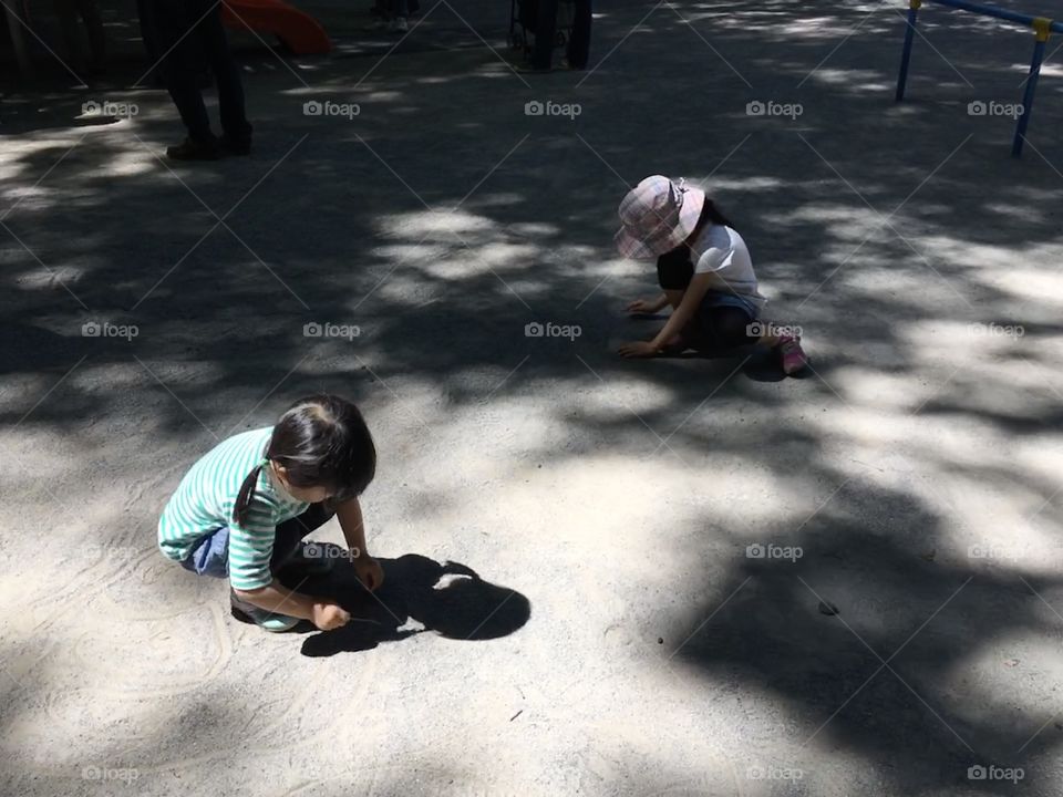 Sisters playing in the park