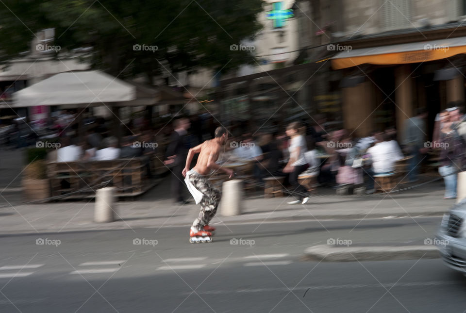 Roller blader. Shirtless roller blader in Paris