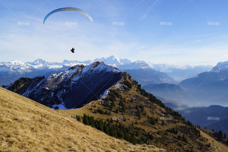 Paragliding in French Alps in front of the Mont-Blanc
