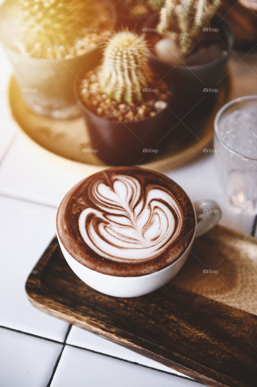 A cup of hot chocolate with latte art
