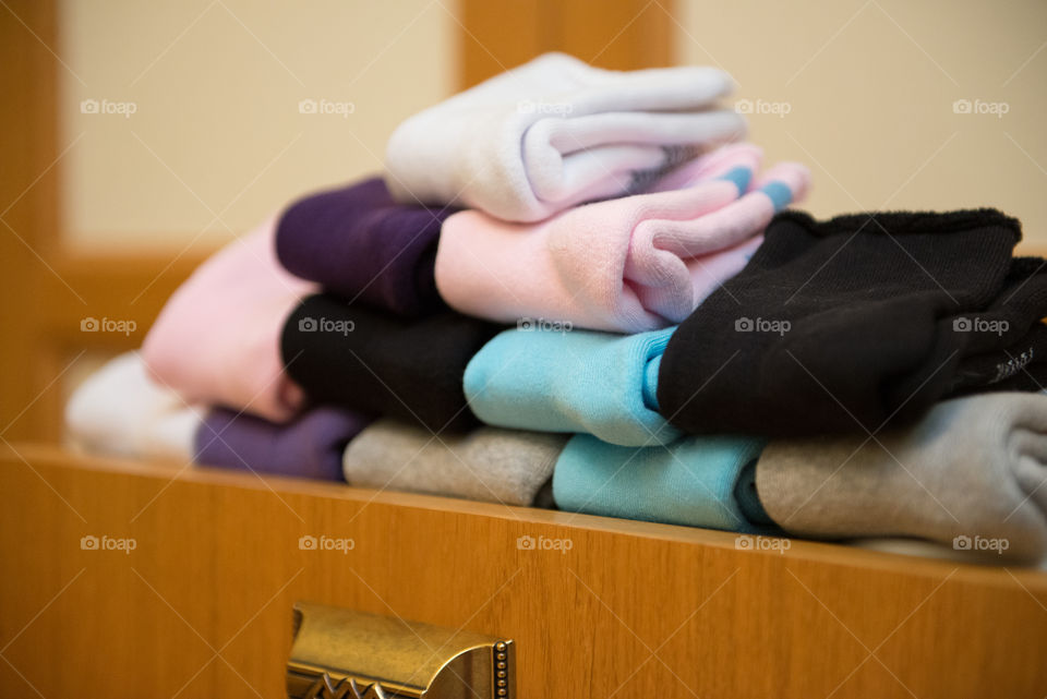 organized socks in a drawer