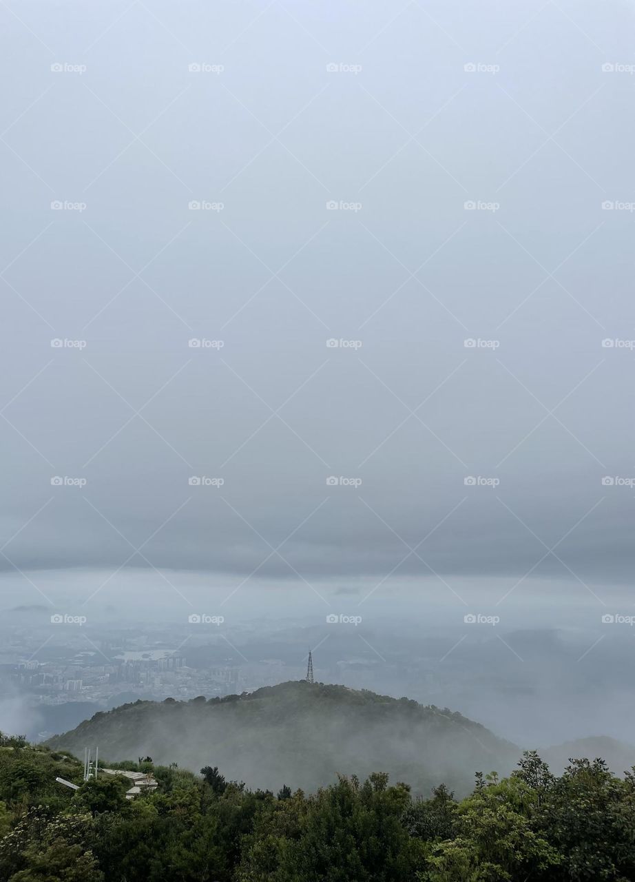 surrounded by clouds