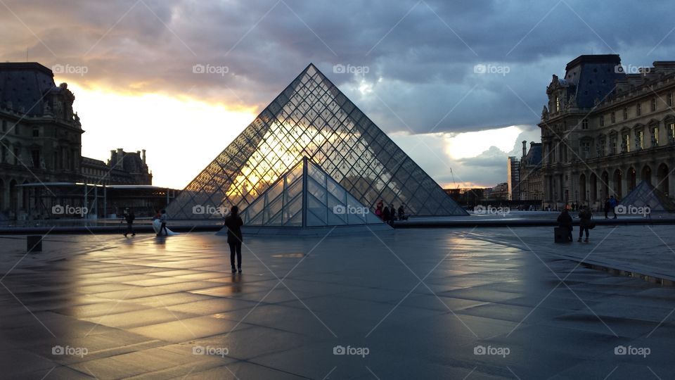 The Louvre Pyramid at sunset