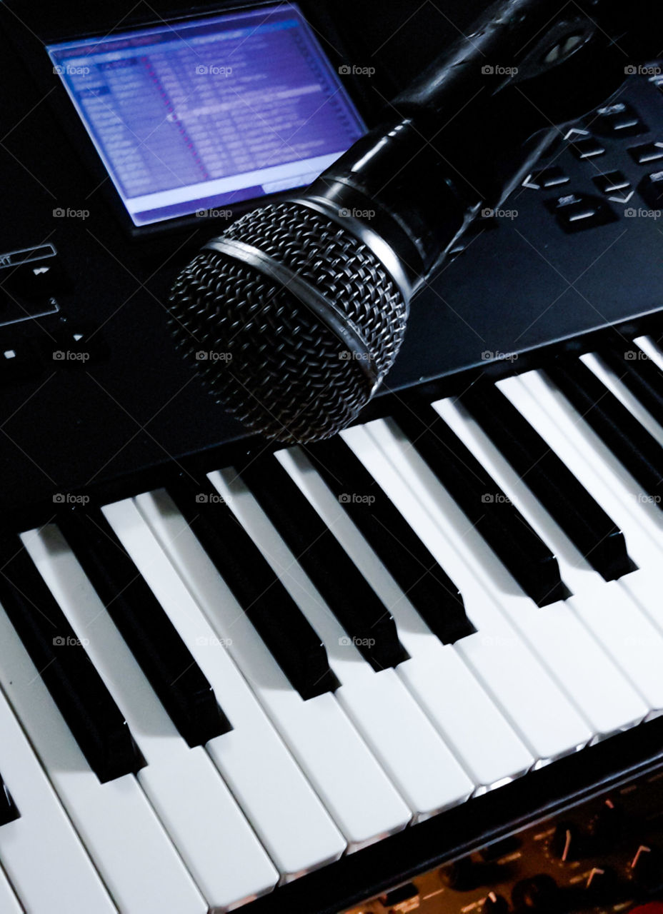 keyboard and microphone. musical composition with keyboard and microphone