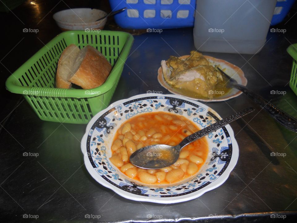 Bread beans and chicken from a street vendor in Marrakech Morocco 