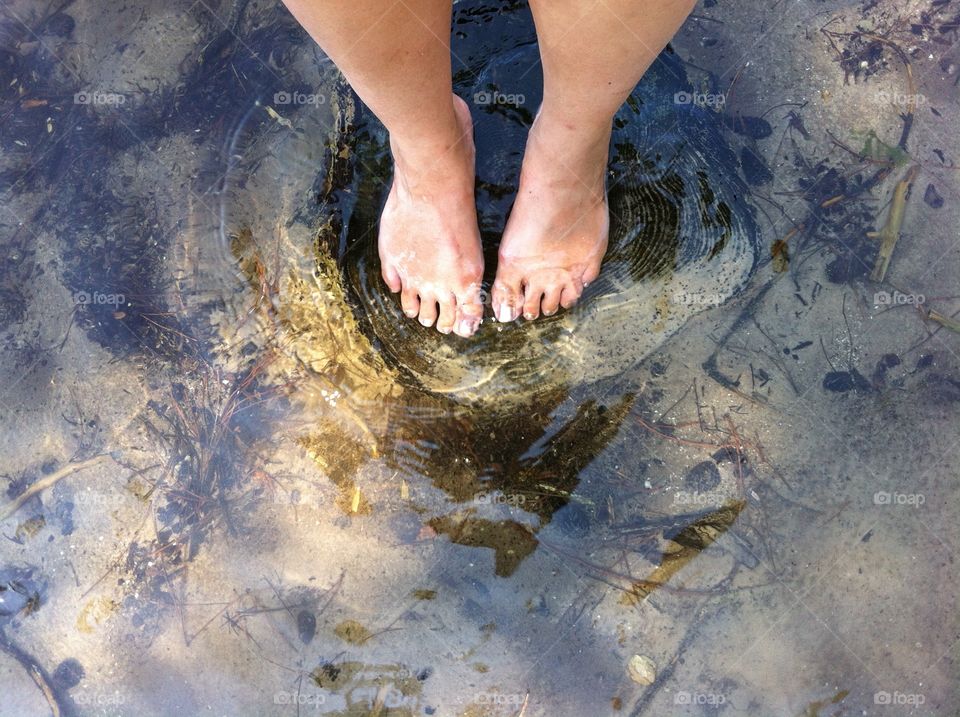 Feet in the water