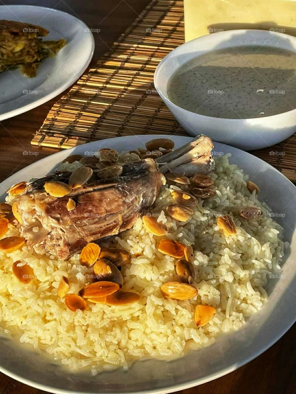 Rice lunch with lamb with Yogurt and freekeh soup