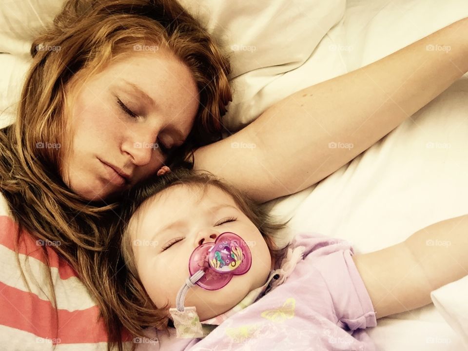 My Favorite Cuddles. Mother and daughter napping