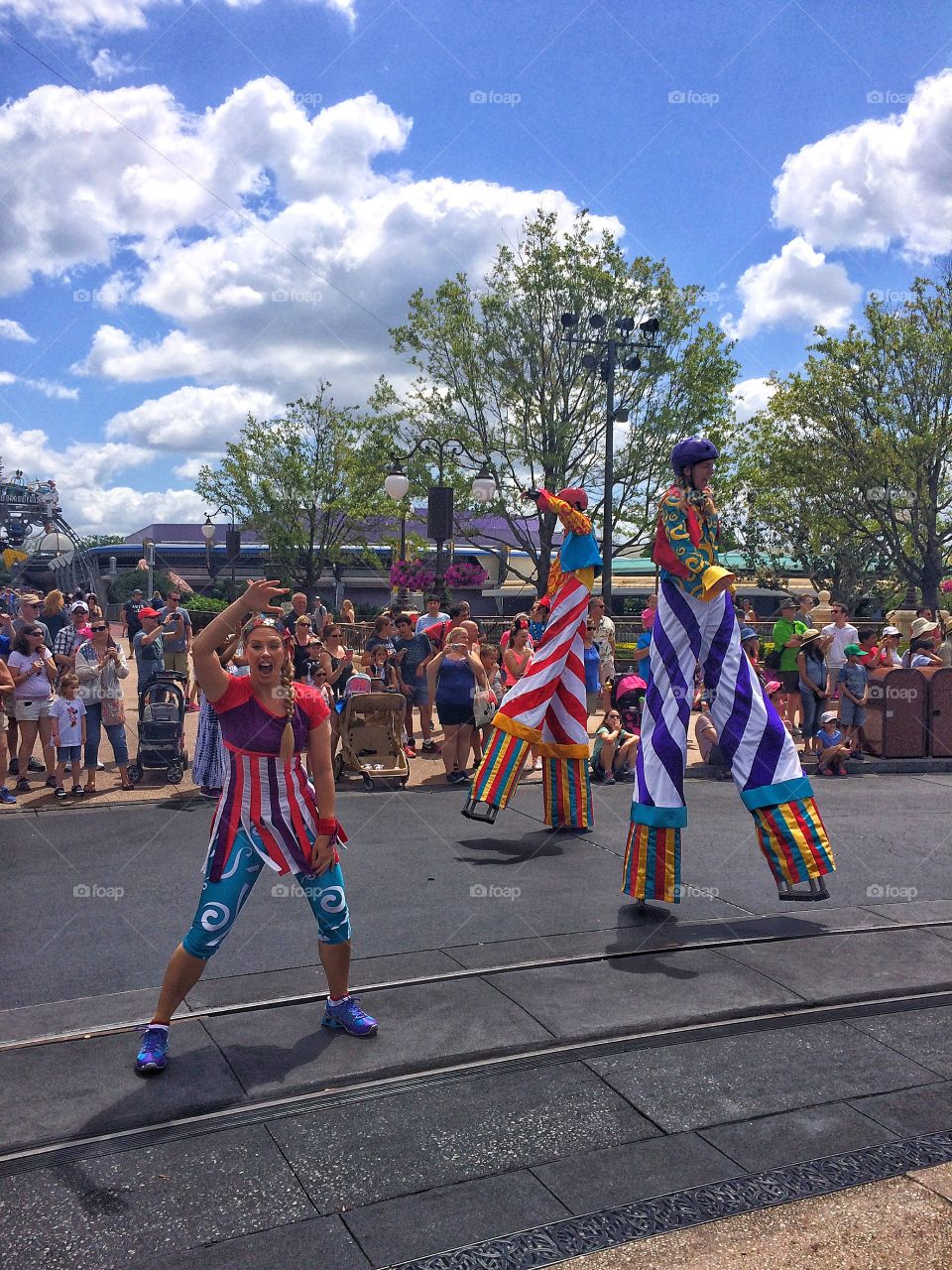 Stilt walker performing on street