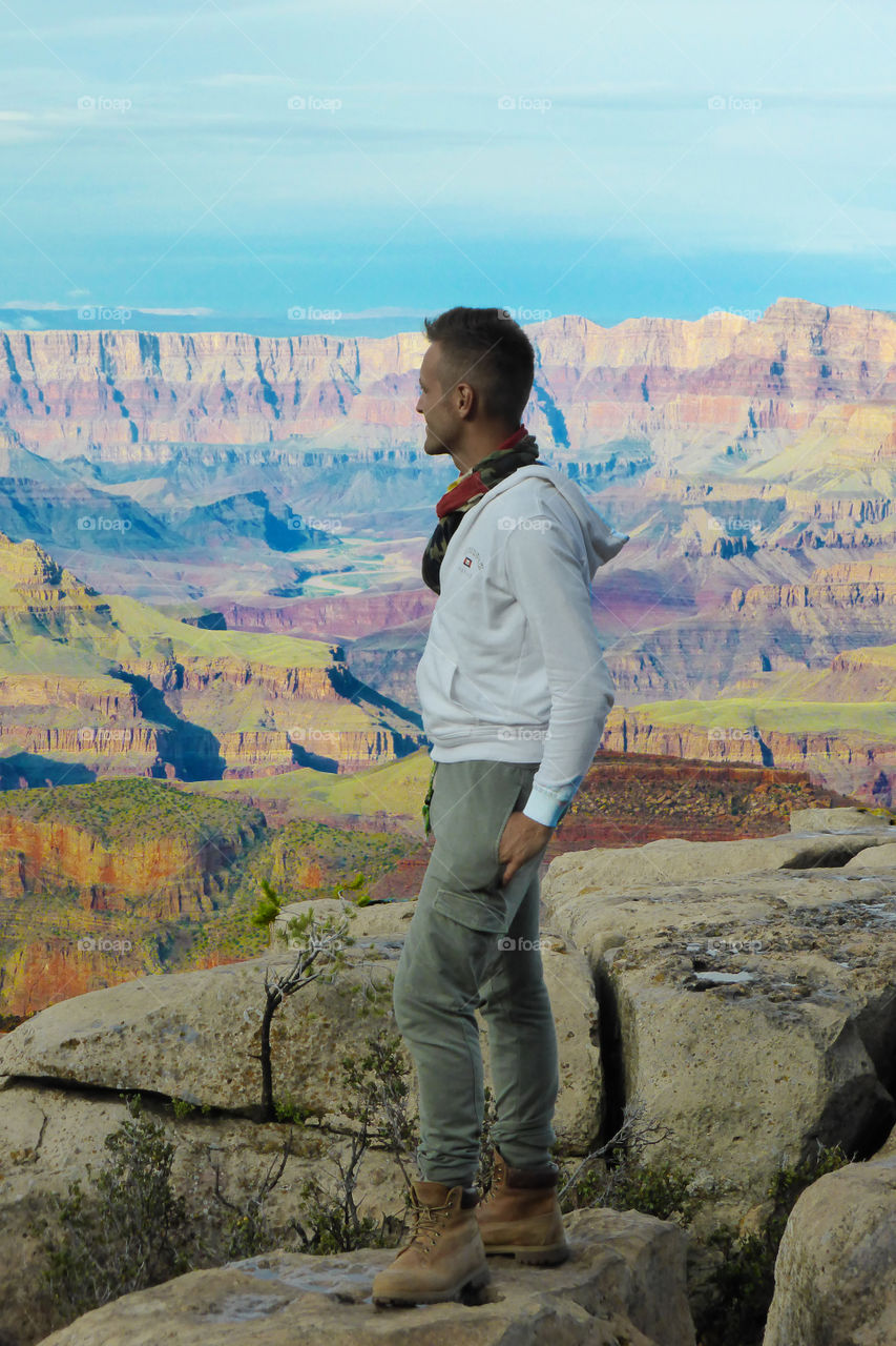 Man in a scenic point of the Grand Canyon 