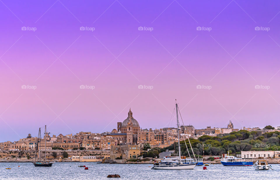 Pink sunset sky over Valletta