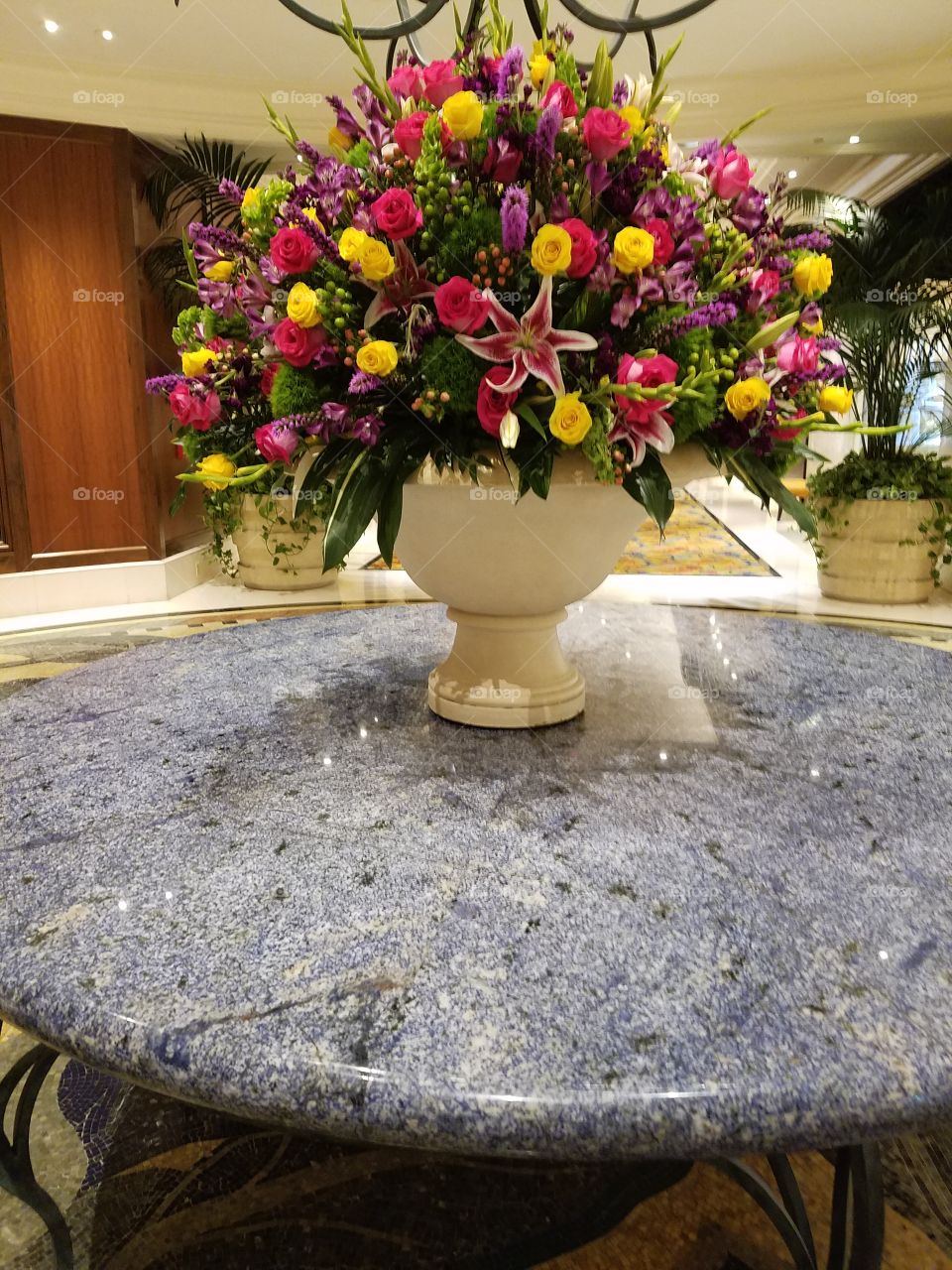 flower arrangement,large, colorful  table setting