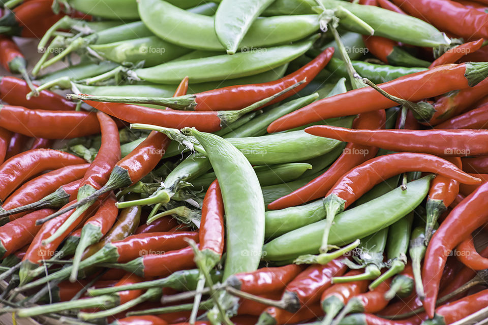 Red peppers and green peas fresh from the garden.