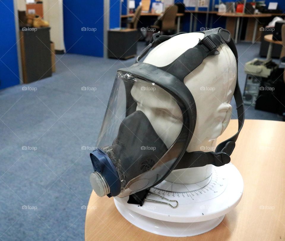 A gas mask or respirator is a health and safety device when working in a place full of toxic gases