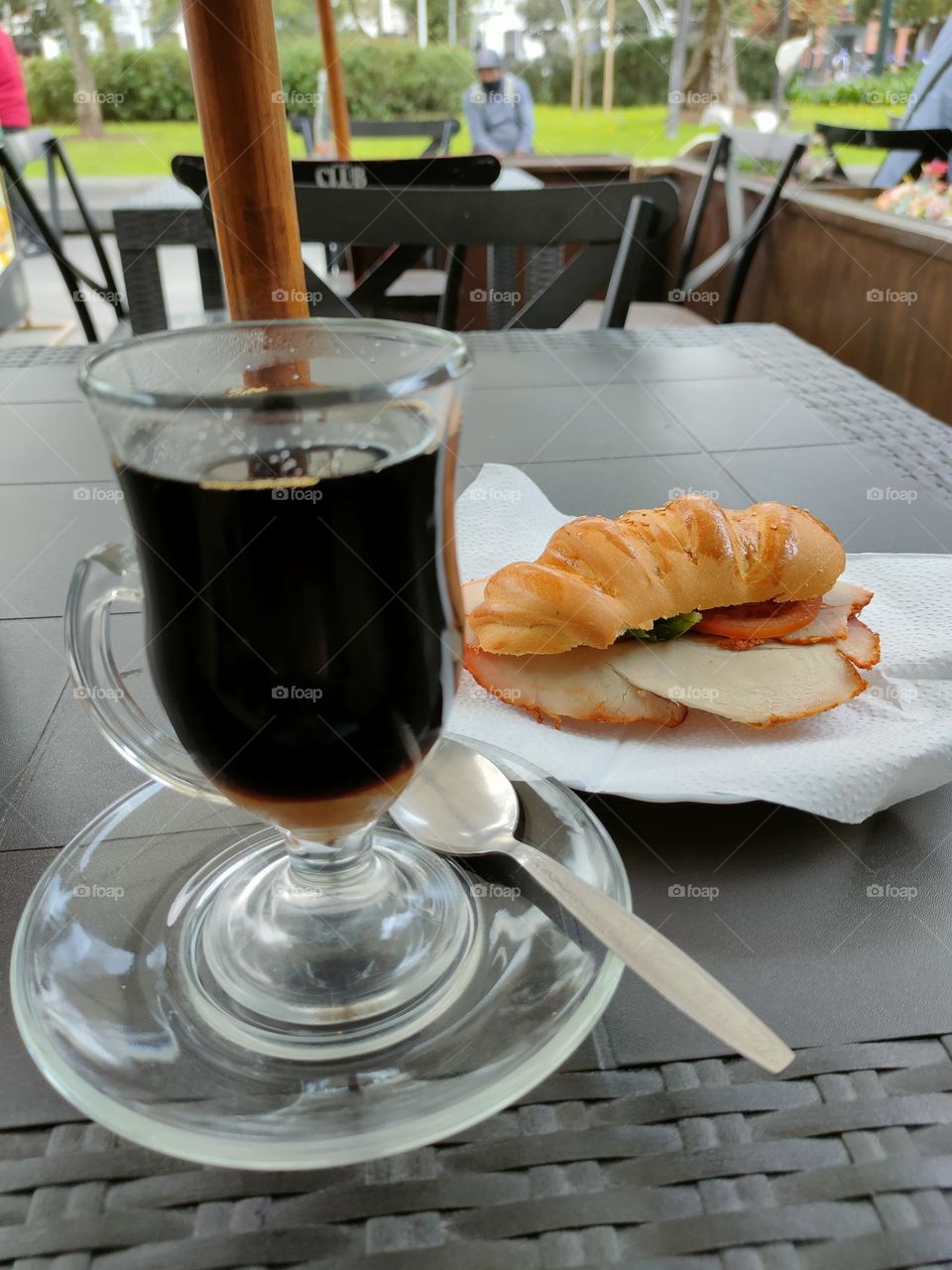 Coffee and pork sandwich